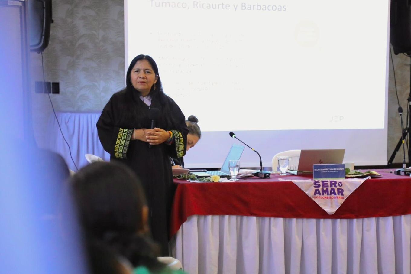 Justice Belkis Izquierdo speaking to victims at a hearing for Macro-Case 02